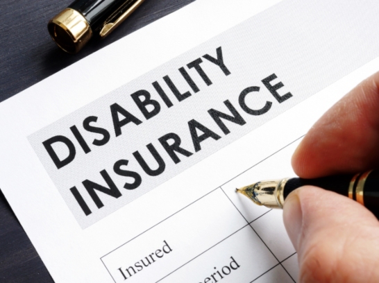 Disability Insurance form being filled out. 