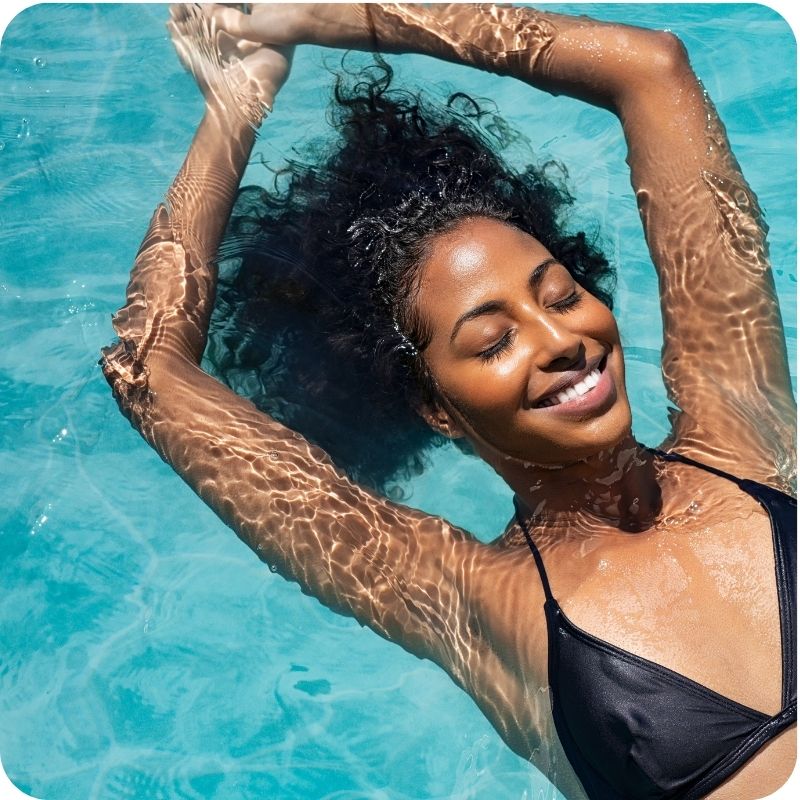 Image of a person swimming in the pool.