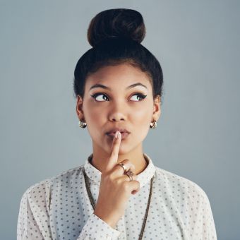 Image of a person shushing.