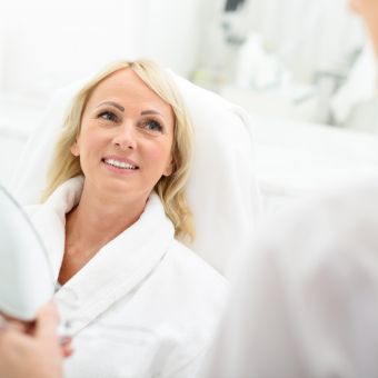Image of an older woman at a spa.