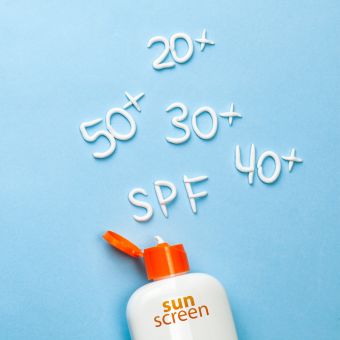 Image of SPF numbers spelled using sunscreen.