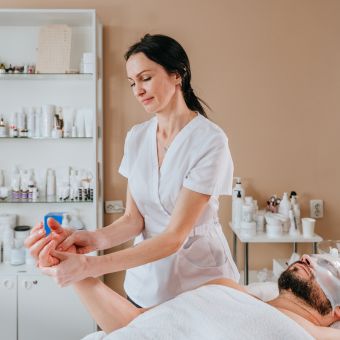 Image of esthetician performing a treatment.