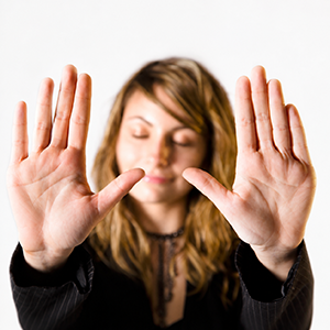 Beauty woman showing her hand palms. Selective focus.
