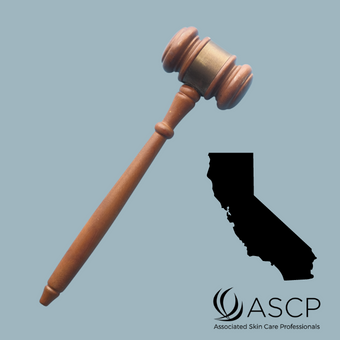 Brown Gavel over blue grey background with shape of California