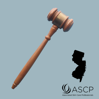 Brown gavel over grey blue background with shape of New Jersey