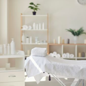 Esthetics treatment table, side cabby, and product shelf