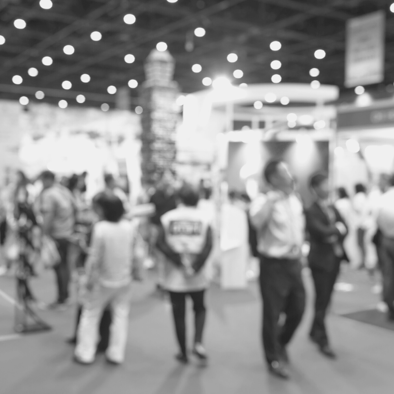 people walking the tradeshow floor