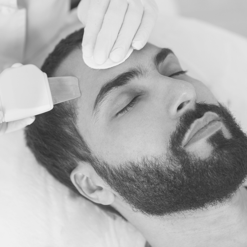 Man receives ultrasonic facial