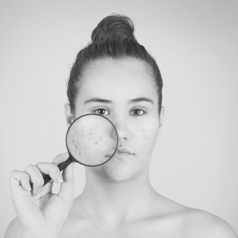 Girl with magnifying glass