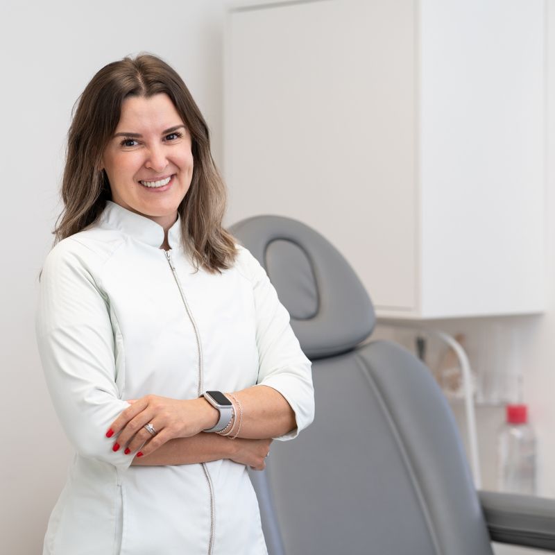 Image of an esthetician in a treatment room.