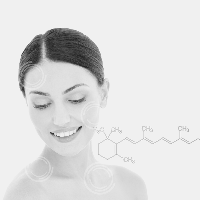 Smiling woman with retinol molecule on her shoulder