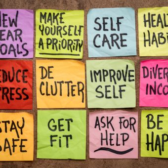 Image of colorful sticky notes with affirmations written on them.