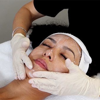 Client receiving a facial treatment.