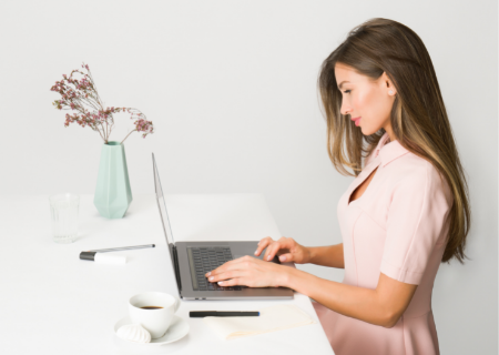 Female entrepreneur sitting at her desk