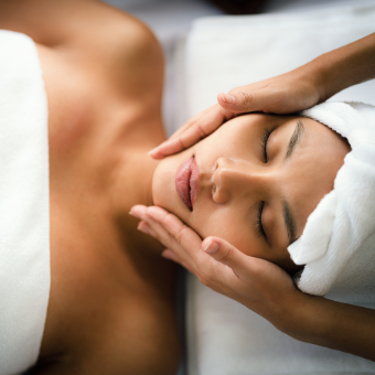 ASCP member performs a facial and is protected under beauty and bodywork insurance.