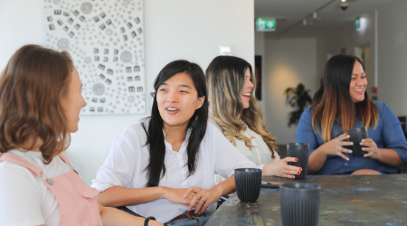 Group of women at a round table