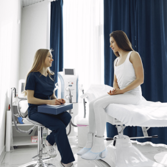 Esthetician engaging with her client