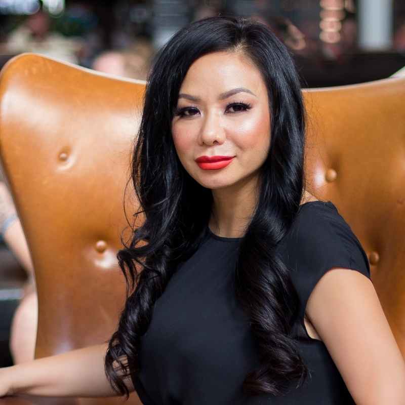 Person sitting on a leather chair. 